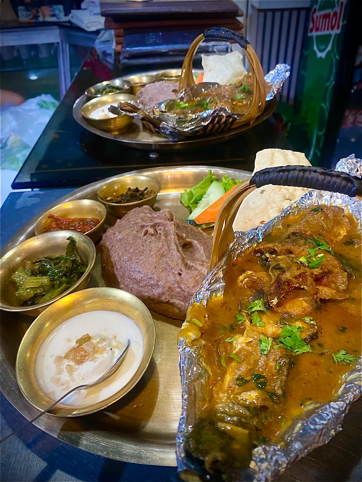 Dhindo thali in boat basket